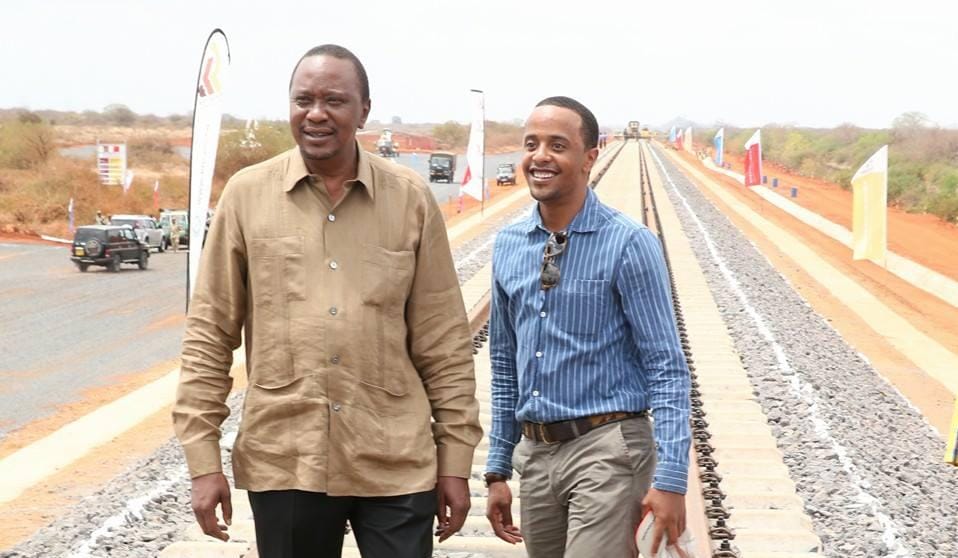 File image of former President Uhuru Kenyatta and his son John Jomo Kenyatta.